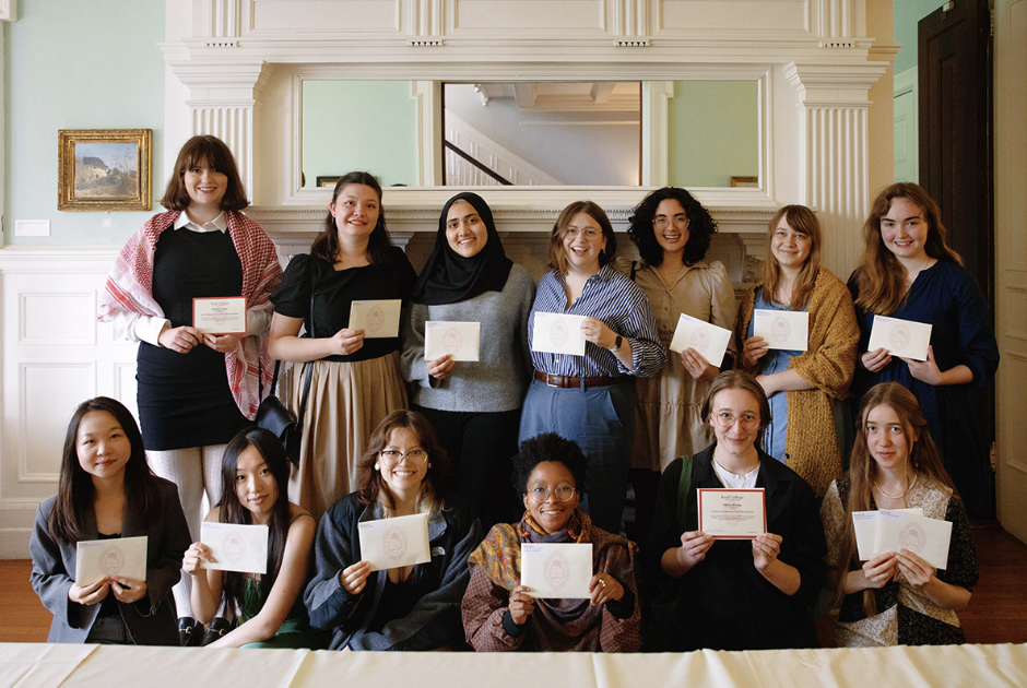 Students pose at an award ceremony. Photo by Queenie Si ’25